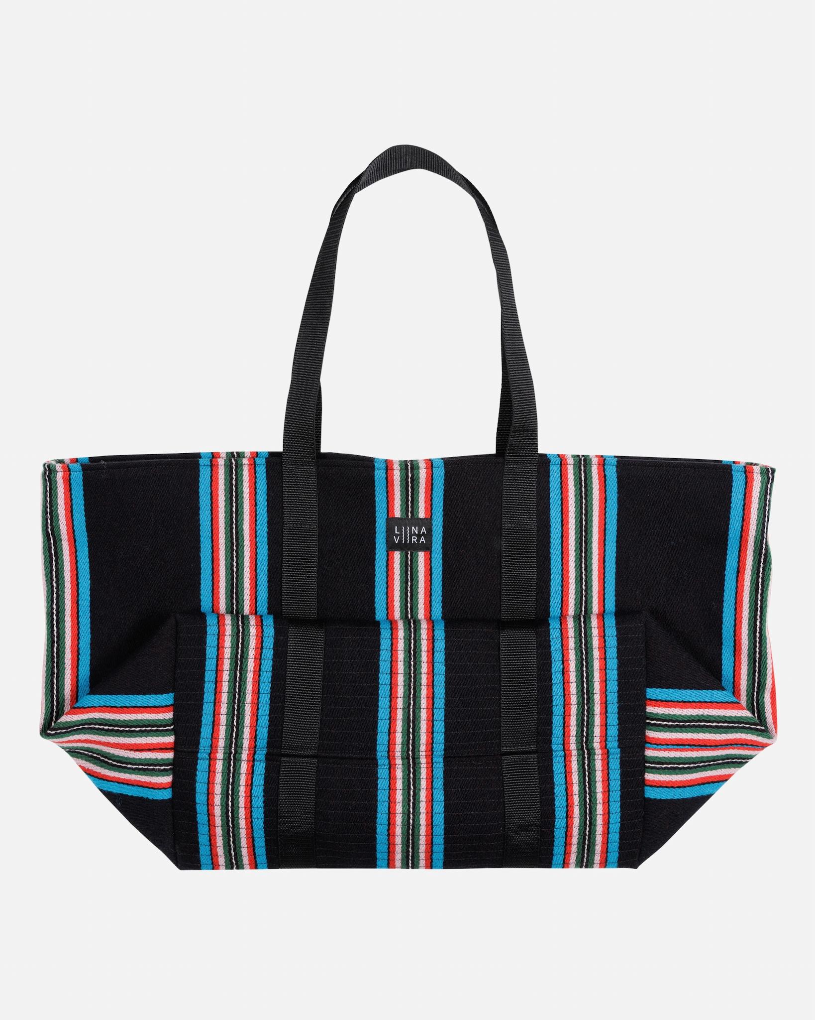 Black tote bag with colorful striped pattern on a white background