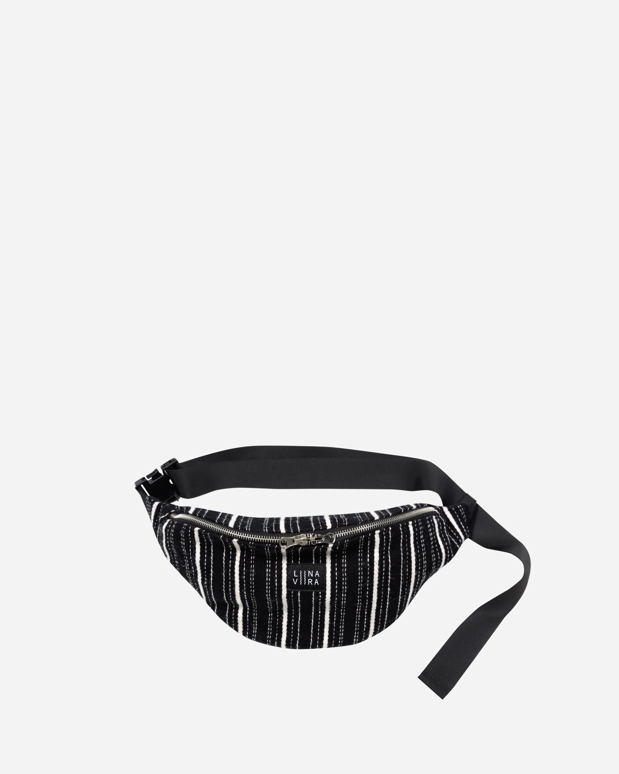 Black and white striped waist bag on a light gray background