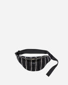 Black and white striped waist bag on a light gray background